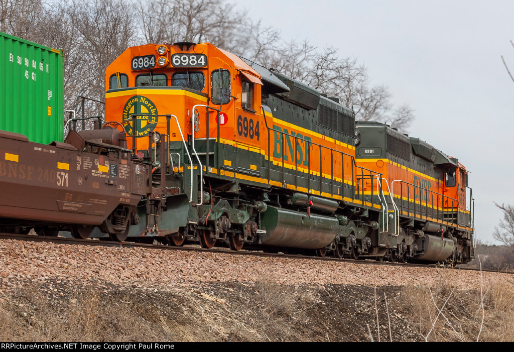 BNSF 6991, ex CN 5054, and BNSF 6984 ex CN 5016 are eastbound on the BNSF
